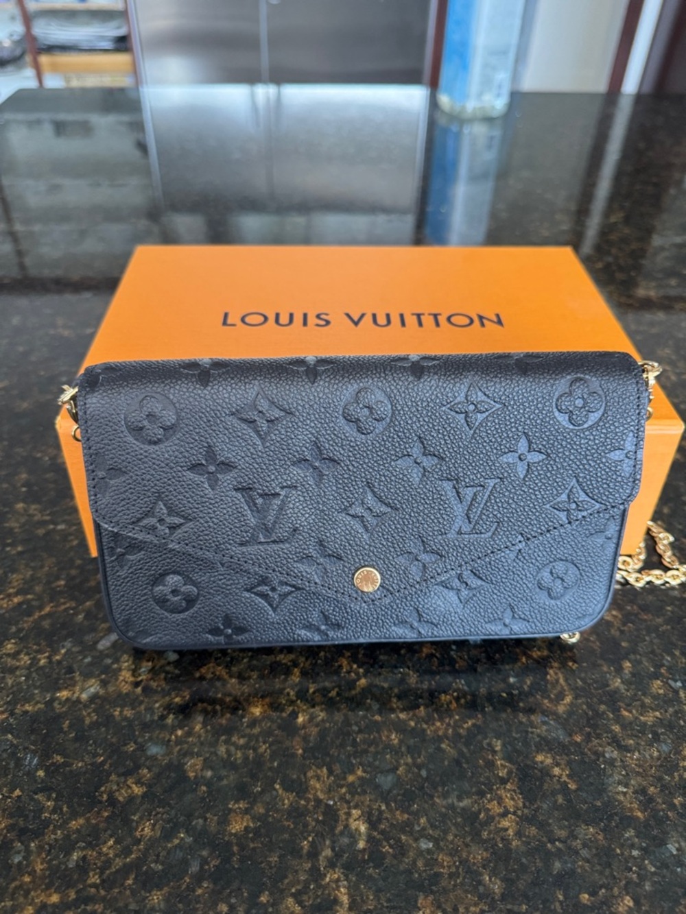 Louis Vuitton Black Monogram-Embossed Crossbody with Gold Hardware